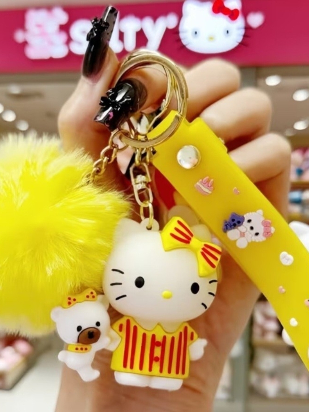 Hello Kitty Yellow Pom Pom Keychain with Character Charms, 3 Piece
